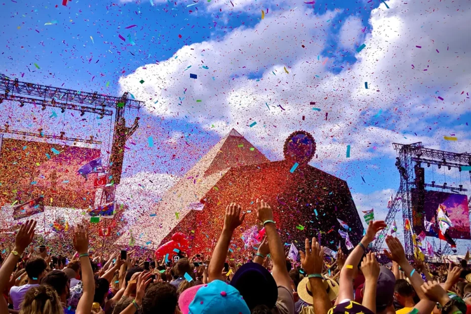 crowd outside with confetti dropping from sky