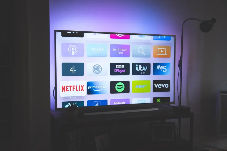 TV with streaming app logos on screen