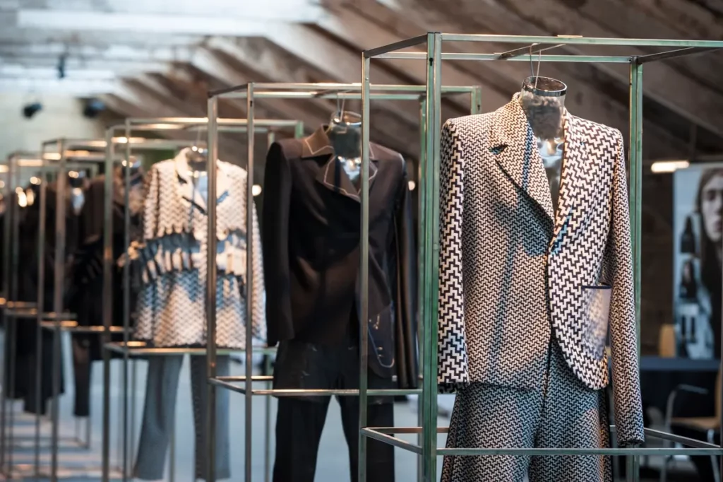 clothes hanging on rail