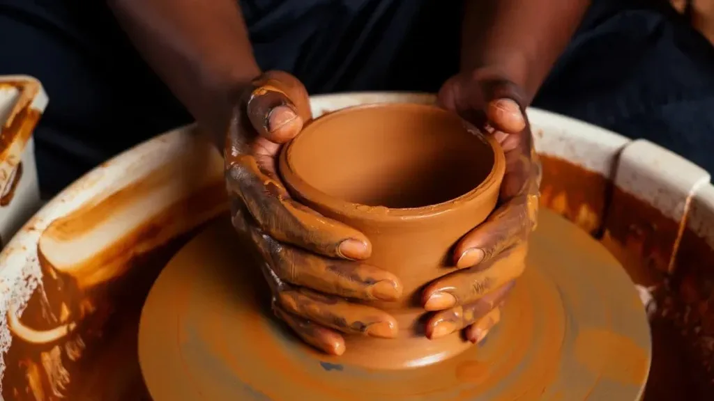 Person doing pottery