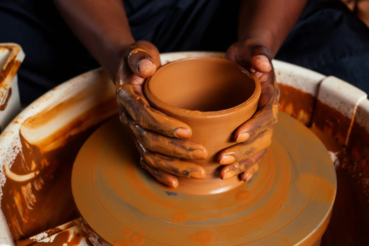 image of potter at wheel