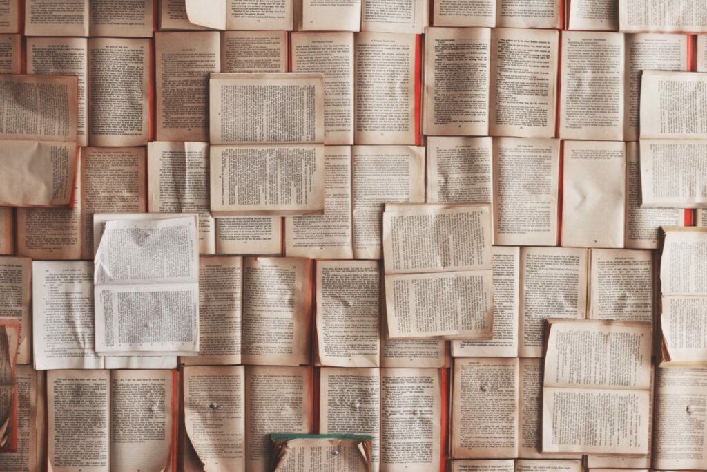 aerial shot of open pages of books - courtesy of Patrick Tomasso