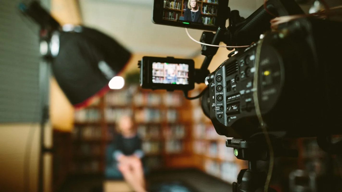 image of camera in library - courtesy of Sam McGhee
