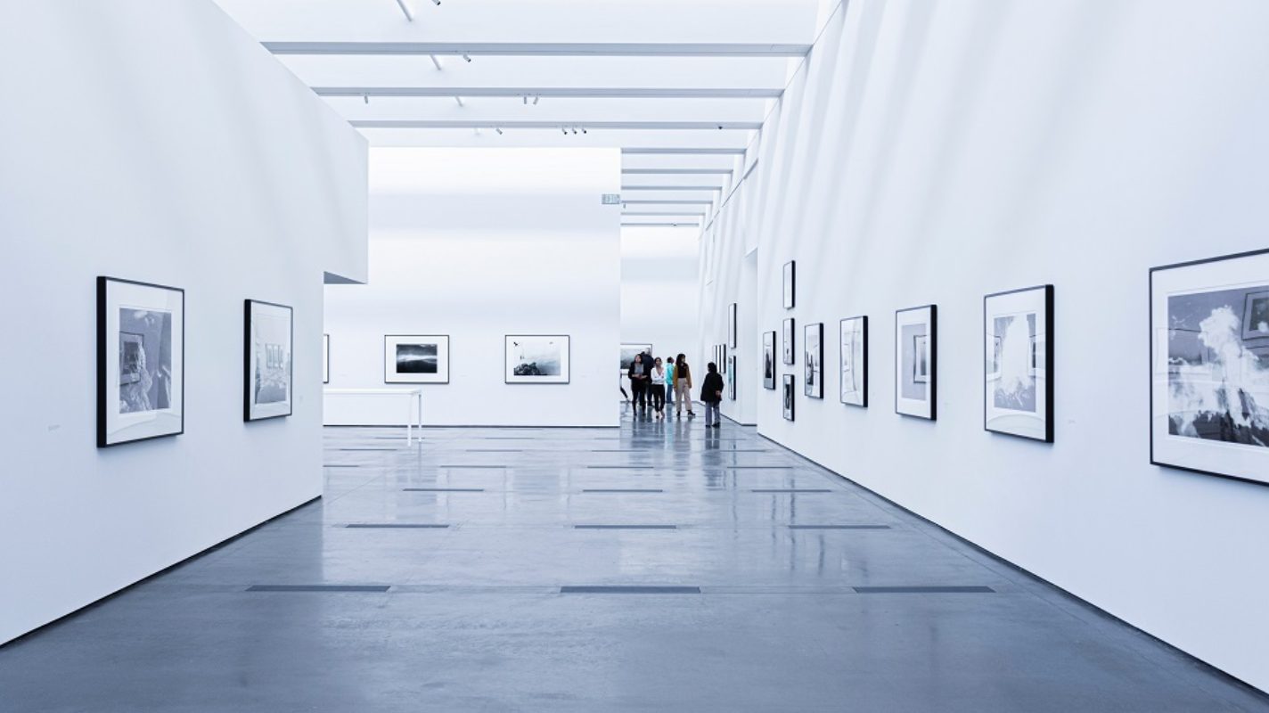 image of art gallery with people in background