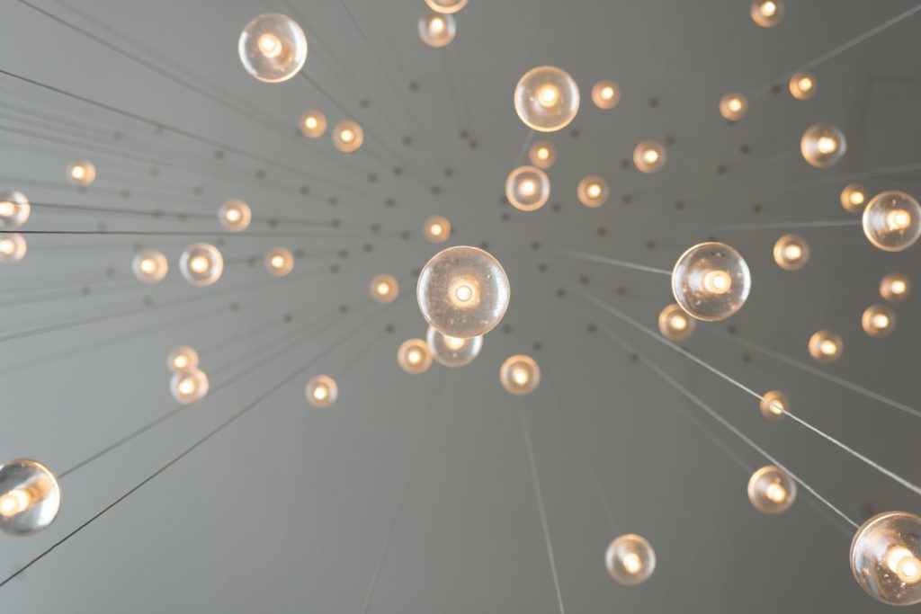 image of lights bulbs hanging from ceiling