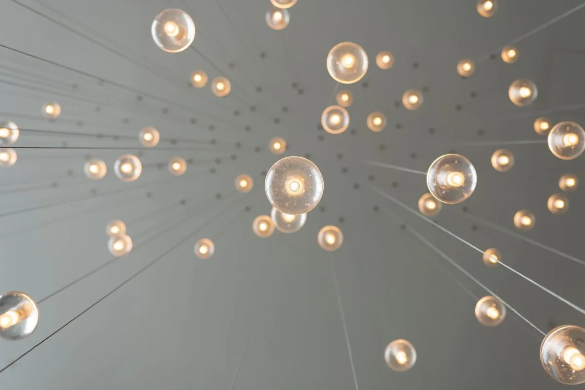 image of lights bulbs hanging from ceiling