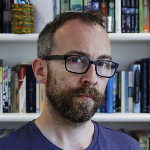 Photo of Simon Jones with beard and glasses