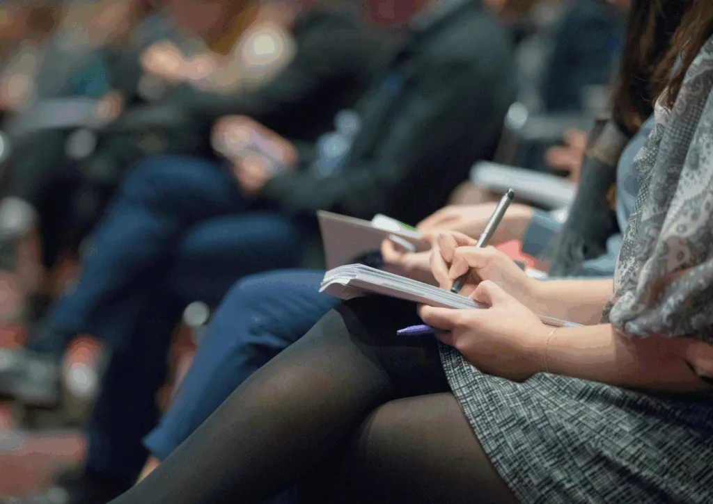 Journalist writing notes