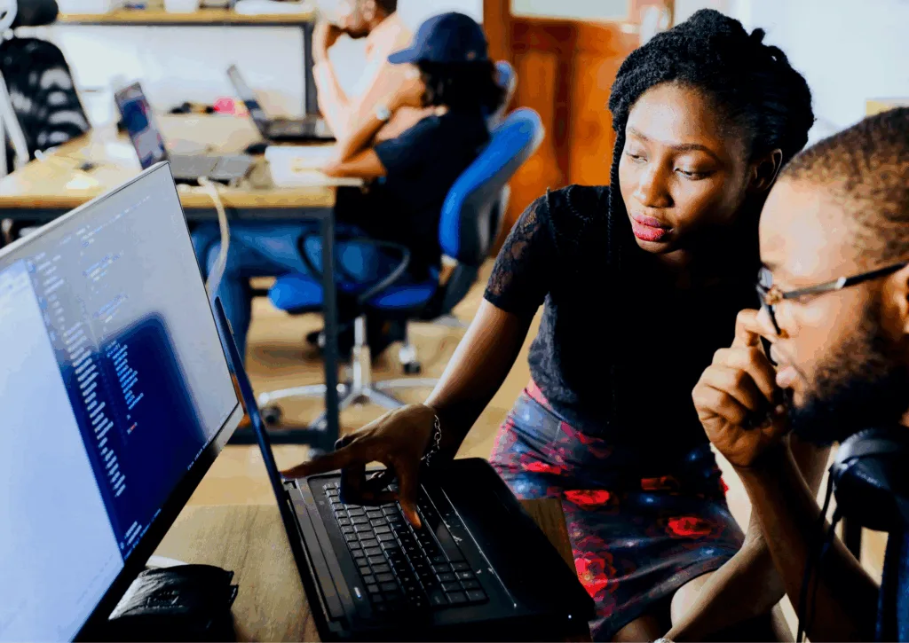 People at a computer - Desola Lanre Ologun - unsplash